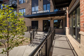 View of outdoor entrance way at The Whitley apartments.