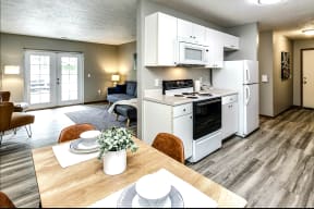 Two bedroom apartment homes with large kitchens and plank flooring at Flatwater in La Vista , NE