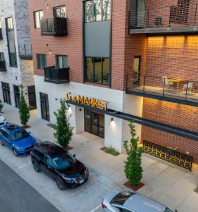 Private Outdoor Courtyard with Yard Games, Grills and Fire Pit at G at Market in Bentonville, AR