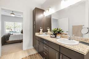 Large bathrooms with granite countertops at Page Living at Pinnacle Hills in Rogers, AR