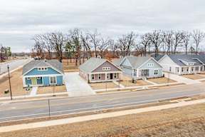 Two and three-bedroom townhomes featuring premium appliances, LVT flooring, garages, custom countertops, custom cabinetry and more at Hawthorne Grove in Rogers, AR
