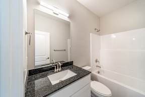 Two and three-bedroom townhomes featuring premium appliances, LVT flooring, garages, custom countertops, custom cabinetry and more at Hawthorne Grove in Rogers, AR