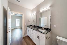 Two and three-bedroom townhomes featuring premium appliances, LVT flooring, garages, custom countertops, custom cabinetry and more at Hawthorne Grove in Rogers, AR
