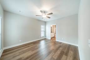 Two and three-bedroom townhomes featuring premium appliances, LVT flooring, garages, custom countertops, custom cabinetry and more at Hawthorne Grove in Rogers, AR