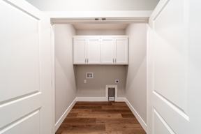 Two and three-bedroom townhomes featuring premium appliances, LVT flooring, garages, custom countertops, custom cabinetry and more at Hawthorne Grove in Rogers, AR
