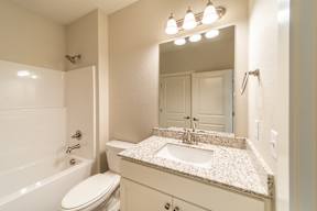 Two and three-bedroom townhomes featuring premium appliances, LVT flooring, garages, custom countertops, custom cabinetry and more at Hawthorne Grove in Rogers, AR