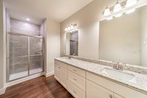 Two and three-bedroom townhomes featuring premium appliances, LVT flooring, garages, custom countertops, custom cabinetry and more at Hawthorne Grove in Rogers, AR