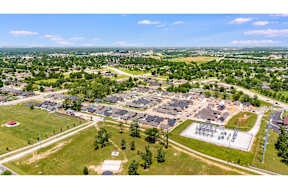 Two and three-bedroom townhomes featuring premium appliances, LVT flooring, garages, custom countertops, custom cabinetry and more at Hawthorne Grove in Rogers, AR