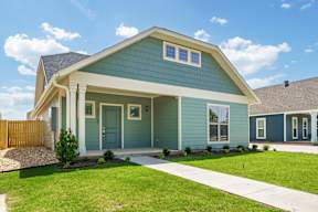 Two and three-bedroom townhomes featuring premium appliances, LVT flooring, garages, custom countertops, custom cabinetry and more at Hawthorne Grove in Rogers, AR