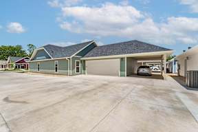 Two and three-bedroom townhomes featuring premium appliances, LVT flooring, garages, custom countertops, custom cabinetry and more at Hawthorne Grove in Rogers, AR