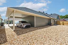 Two and three-bedroom townhomes featuring premium appliances, LVT flooring, garages, custom countertops, custom cabinetry and more at Hawthorne Grove in Rogers, AR