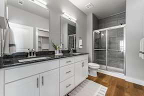Two and three-bedroom townhomes featuring premium appliances, LVT flooring, garages, custom countertops, custom cabinetry and more at Hawthorne Grove in Rogers, AR