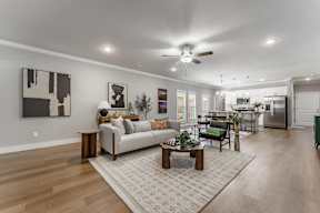 Two and three-bedroom townhomes featuring premium appliances, LVT flooring, garages, custom countertops, custom cabinetry and more at Hawthorne Grove in Rogers, AR