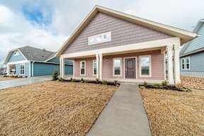 Two and three-bedroom townhomes featuring premium appliances, LVT flooring, garages, custom countertops, custom cabinetry and more at Hawthorne Grove in Rogers, AR