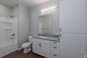 Bathroom with ample storage at The Boulevard in Joplin, MO