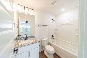 Bathroom with bathtub at The Grove in Rogers, AR