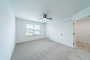 Bedroom at The Grove in Rogers, AR