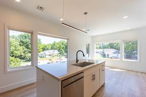 Studio, one and two bedroom apartment homes at The Howard East Central in Bentonville, AR