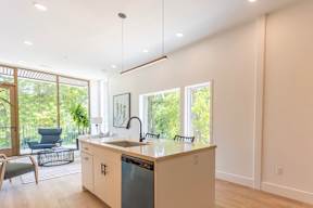 Studio, one and two bedroom apartment homes at The Howard East Central in Bentonville, AR