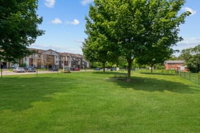 Lush Green Landscape at Residences at Grand Blanc Apartments - Grand Blanc, MI, Michigan, 48507