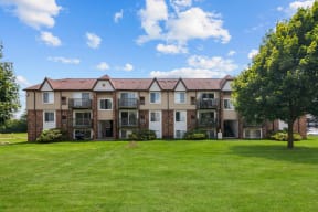 Lush Green Outdoor at Residences at Grand Blanc Apartments - Grand Blanc, MI, Michigan