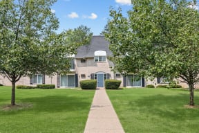 Long walkway leading to the front door at Apple Ridge Apartments - Livonia, MI, Michigan, 48152