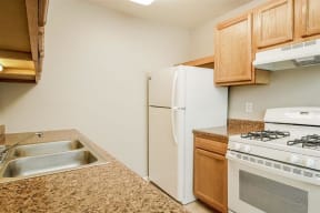 Sink With Faucet at Residences at Grand Blanc Apartments - Grand Blanc, MI, Michigan, 48507