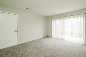Carpeted Living Area at Residences at Grand Blanc Apartments - Grand Blanc, MI, Grand Blanc Twp, Michigan