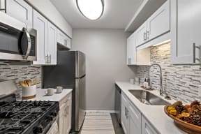 Kitchen at Residences at Grand Blanc Apartments - Grand Blanc, MI, Grand Blanc Twp, Michigan