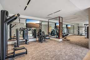 The resort-style fitness center with cardio and weight-lifting equipment  at The Mera, St Louis Park, Minnesota
