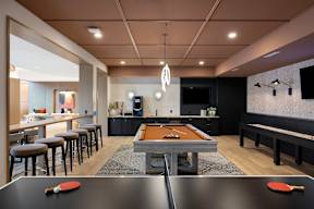 Game Lounge with billiards, ping pong, foosball, and shuffleboard at The Mera, St Louis Park, MN