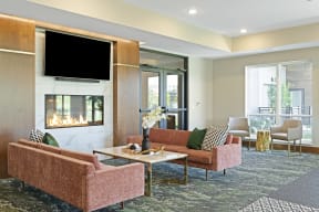 Fireside lounge at Nuvelo at Parkside Apartments in Apple Valley