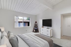 One bedroom at Idylwood apartments with furniture
