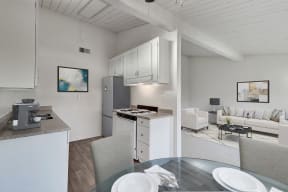 Kitchen, dining, and living room area in a one bedroom at Idylwood apartments