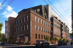 a rendering of a brick building on a city street at Glassworks, Philadelphia, PA, 19122