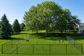 A tennis court with the word "LLL" written on it.