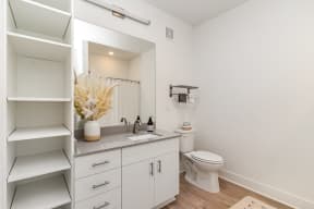 a view of a ceiling of a large room with a ceiling fan and at City View Apartments, Lansing, 48933