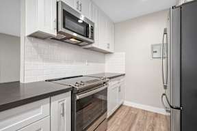 Kitchen With New Appliances at Los Robles Apartments, Pasadena, CA