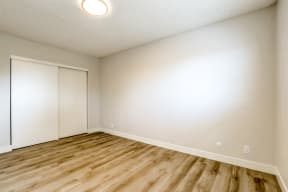 Open floor plan with hardwood flooring.