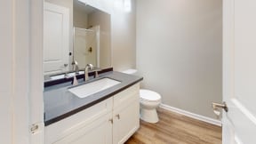 a bathroom with a sink and a toilet at Charter Oaks Apartments, California, 91360