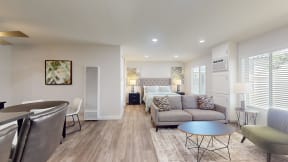 a living room with a couch and a table at Charter Oaks Apartments, California, 91360