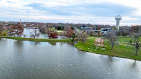 an aerial view of a lake and a water tower at Mihir Taylor, Taylor, TX