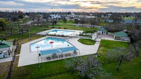 an aerial view of a swimming pool in a park at Mihir Taylor, Texas