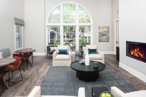 Resident lounge with seating and fireplace at Missions at Chino Hills, Chino Hills, CA