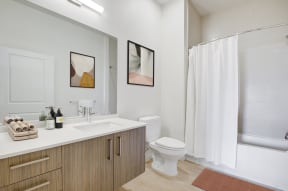 Bathroom with tub and toilet at MODE, California