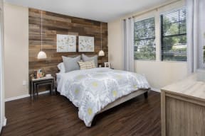 Rancho Bernardo, San Diego, CA Apartments-The Reserve at 4S Ranch-Bedroom with Hardwood Style Flooring, Large Windows, and Over Heading Lighting