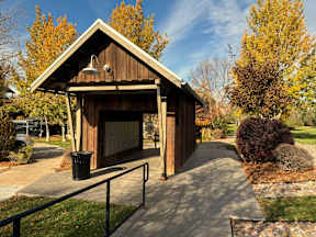 Covered pavilion with community bulletin board at Mullan Reserve Apartments, Missoula, Montana