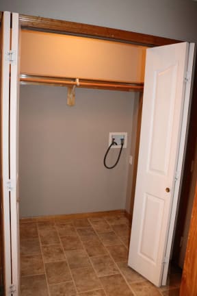 the bathroom has a shower and a toilet in it