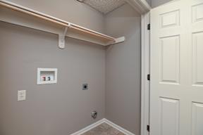 A white door is on the right side of the image.