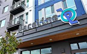 A building with a sign that says "Paceline" on it.